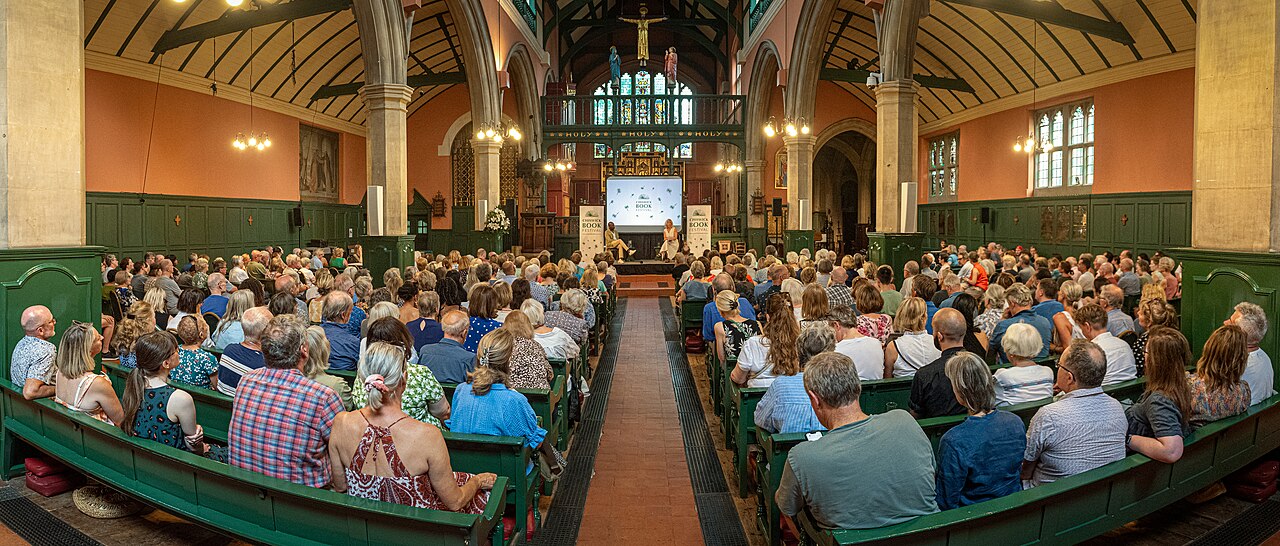 Clive Myrie speaking to an audience at the Chiswick Book Festival